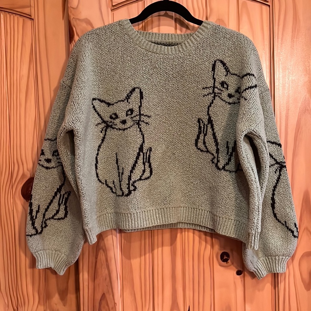 Green SHEIN sweater with black cat outlines